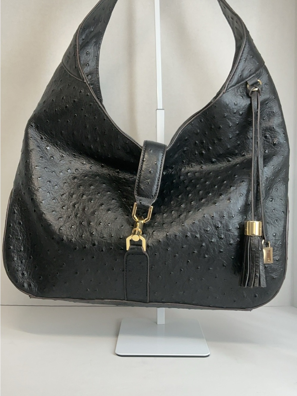 G.I.L.I. Verona black leather ostrich-embossed hobo shoulder bag.